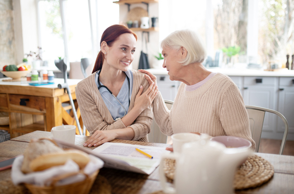 Assisted living advisor taking care of senior.