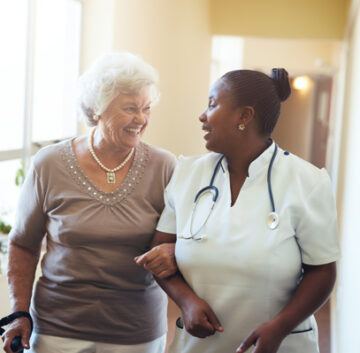 Assisted living advisor taking care of senior.